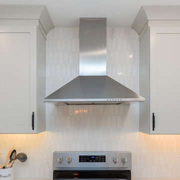 White Kitchen with Picket Backsplash