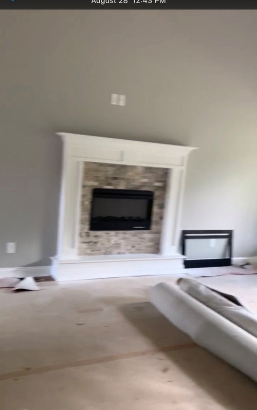 Windows beside fireplace, east facing wall