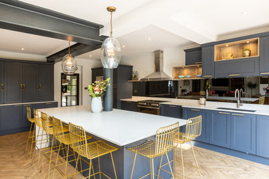 This is an example of a contemporary kitchen in Surrey.