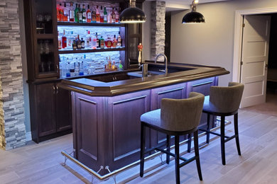 Seated home bar - mid-sized modern u-shaped seated home bar idea in Other with an undermount sink, floating shelves, dark wood cabinets, wood countertops and brown countertops