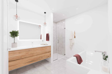 Inspiration for a large modern master white tile ceramic tile, gray floor and single-sink bathroom remodel in Montreal with flat-panel cabinets, light wood cabinets, a two-piece toilet, white walls, a drop-in sink, quartz countertops, a hinged shower door, white countertops and a floating vanity