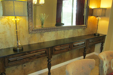 Inspiration for a transitional dining room remodel in Phoenix with green walls