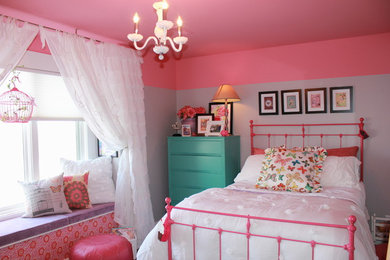 Inspiration for a mid-sized contemporary carpeted bedroom remodel in Kansas City with pink walls