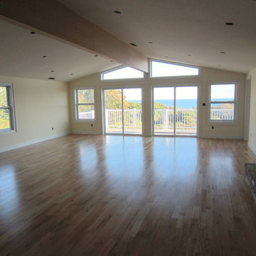 MONTAUK NEW CONSTRUCTION: 3 1/4" #1 RED OAK INSTALLED AND FINISHED NATURAL!