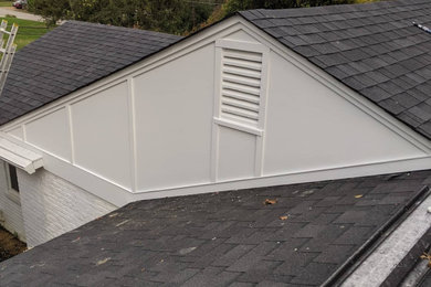 Small elegant white two-story concrete fiberboard and board and batten house exterior photo in Cincinnati