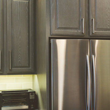 Gray Cabinets Transform a Texas Kitchen