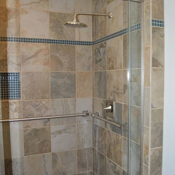 Bath Remodel with Cabinets in Maple Briarwood Stain and Silestone Lagoon Tops