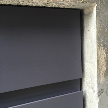 Concrete, Corian & Walnut Kitchen