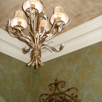 Bathrooms: A metallic gold ceiling in cross-hatching weave pattern