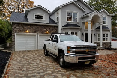 Example of a transitional garage design in New York
