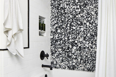Inspiration for a small modern kids' alcove bathtub remodel in DC Metro with flat-panel cabinets, white cabinets, a one-piece toilet, white walls and quartzite countertops