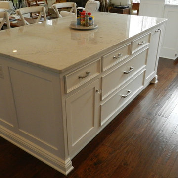Working island with drawer bank and trash pullout