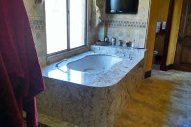 Tuscan bathroom photo in Los Angeles
