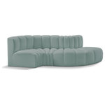 Meridian Furniture - Arc Vegan Leather Upholstered 4-Pc. S-Shaped Modular Sofa, Green - Unleash modern opulence with the Arc Vegan Leather 4pc. Sectional. Crafted for the modern connoisseur, this Sectional injects an air of refined luxury into any space. Its sleek silhouette, upholstered in supple mint green vegan leather, exudes timeless sophistication while the deep channel tufting adds textural intrigue, further elevating the chair's visual appeal. The modular design makes it a versatile chameleon, effortlessly adapting to your evolving needs and preferences. Whether you envision it gracing a chic living room corner, basking in the glow of a bedroom window, or adding a touch of drama to a home office, the Arc seamlessly complements your unique interior aesthetic.