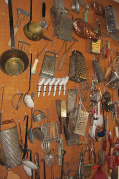 Hanging suggestions for collection of antique utensils
