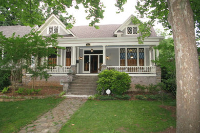 Traditional gray two-story wood gable roof idea in Atlanta