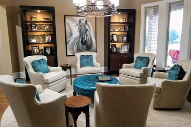 Photo of a large transitional formal enclosed living room in Dallas with no tv, beige walls, dark hardwood floors, no fireplace and brown floor.