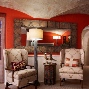 Design ideas for a mediterranean formal living room in Chicago with red walls and carpet.