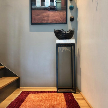 Minimalistic staircase landing complete with Persian Gabbeh Rug!