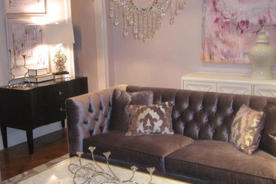 Inspiration for an eclectic formal and enclosed medium tone wood floor living room remodel in New York with purple walls and no fireplace