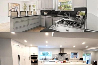 Example of a large minimalist galley light wood floor kitchen design in Toronto with an undermount sink, shaker cabinets, white cabinets, quartz countertops, gray backsplash, porcelain backsplash, paneled appliances, an island and white countertops