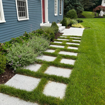 Cape style home front yard