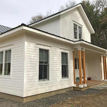 Stone Ridge New Exterior- novelty siding, Red Balau decking, exterior paneling