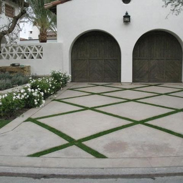 Concrete Driveway with Criss-Crossing Strips of Grass