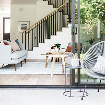 Gray Acapulco Chairs in Indoor-Outdoor Living Room