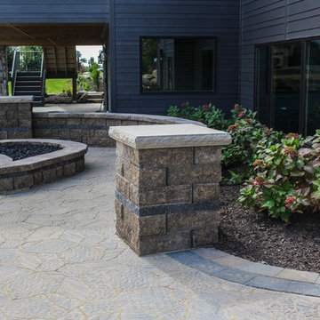 Side View of Buzzing Softscapes with Fine Patio, Wall, and Fire Pit