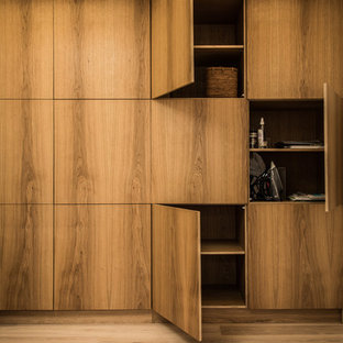 Inspiration for a modern study in London with white walls and a built-in desk.