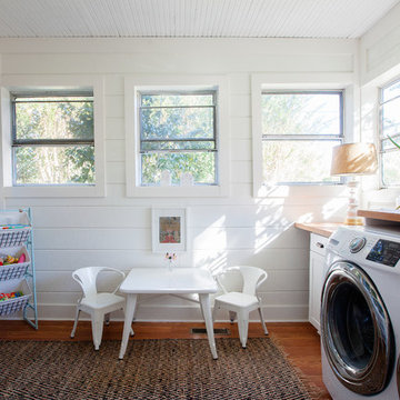 Wash, Rinse and Play in This Multipurpose Laundry Room