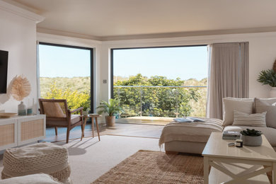 Photo of a coastal living room in Cornwall with carpet.