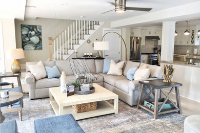 Family room - mid-sized transitional open concept light wood floor and beige floor family room idea in Bridgeport with a bar, beige walls, no fireplace and a media wall