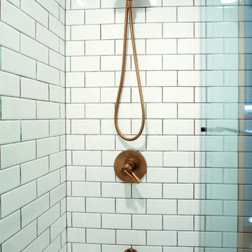 Subway Tile Shower Walls with Bronze Fixtures