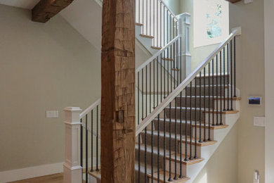 Example of a beach style staircase design in Other