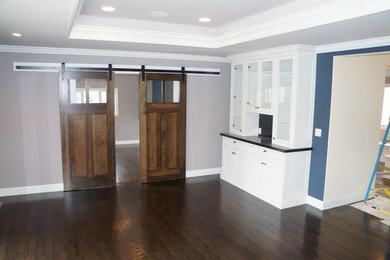Inspiration for a large timeless dark wood floor dining room remodel in San Francisco with blue walls
