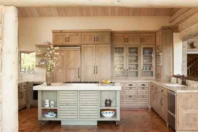 Inspiration for a mid-sized country u-shaped medium tone wood floor and brown floor open concept kitchen remodel in San Francisco with an undermount sink, shaker cabinets, medium tone wood cabinets, granite countertops, stainless steel appliances, an island and beige countertops