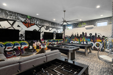 Inspiration for a contemporary gender-neutral carpeted kids' room remodel in Orlando with multicolored walls
