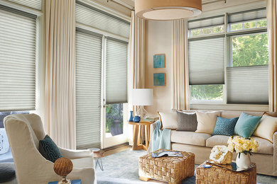 Example of a mid-sized transitional formal carpeted and blue floor living room design in New York with beige walls