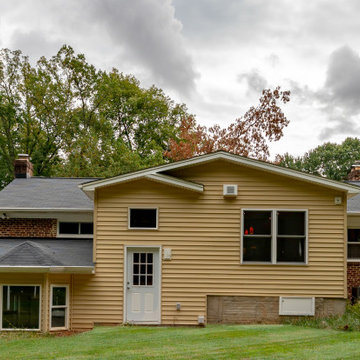 Cheerful Multi Level Rear Addition to Expand Kitchen, Mudroom & Sunroom in Oakt
