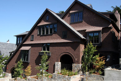 Photo of a traditional three-storey brown exterior in San Francisco with wood siding.