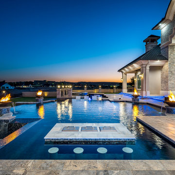 Modern Estate Backyard with Luxury Pool and In-Pool Bar