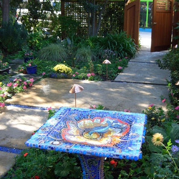 Garden mosaic bird bath and sculpture