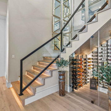 Glass-Enclosed Staircase Wine Display