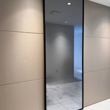 Custom Sliding Door System with Leather Wall Paneling by VelArt