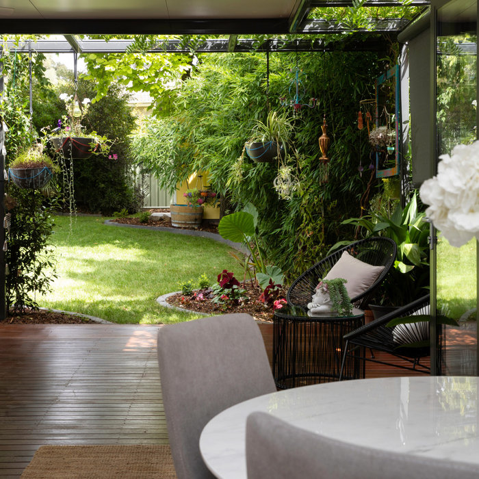 The rear was opened up to encourage connection to the newly landscaped green spaces, using this to make the small space feel larger, but also playing on biophilic design principles of integrating gree
