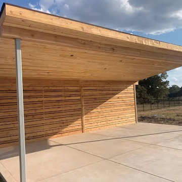 Cover patio with a privacy fence with tongue and groove ceiling