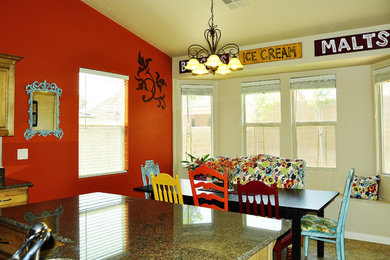 Eat-in kitchen - eclectic eat-in kitchen idea in Salt Lake City with raised-panel cabinets and medium tone wood cabinets