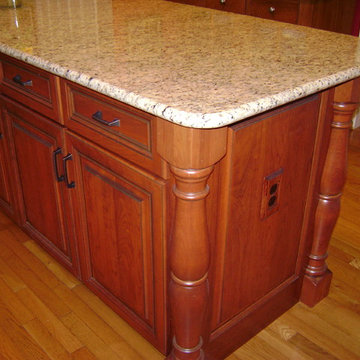 Traditional White Kitchen with Contrasting Cherry Island in Occoquan, VA